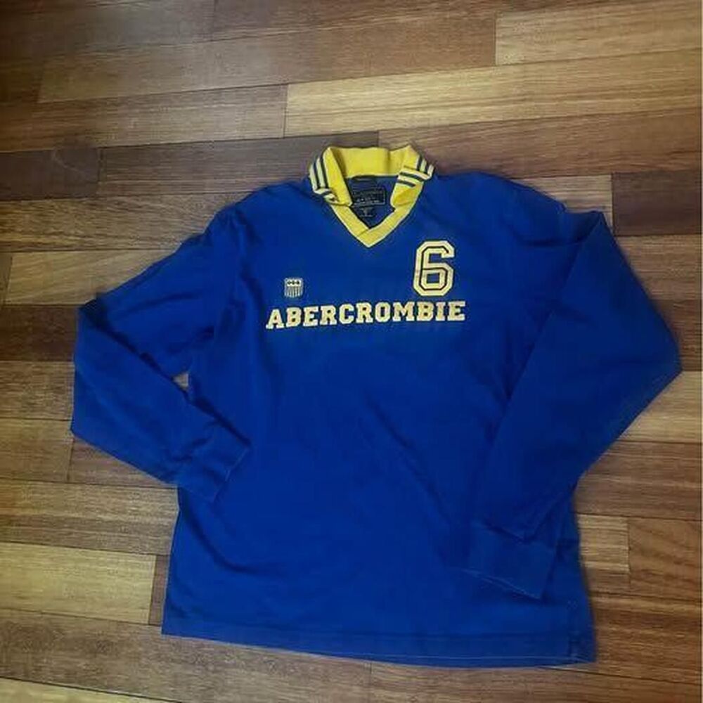 Vintage Abercrombie & Fitch Women's (size L) Blue 90s Jersey Shirt